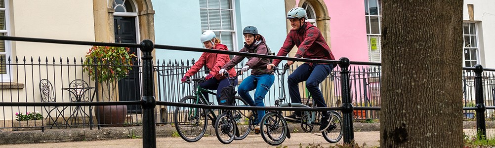 A group of cycle commuters on electric bikes